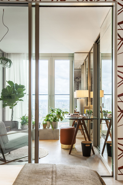 This apartment at South Bank Tower London designed by 1508 London features an indoor garden that link