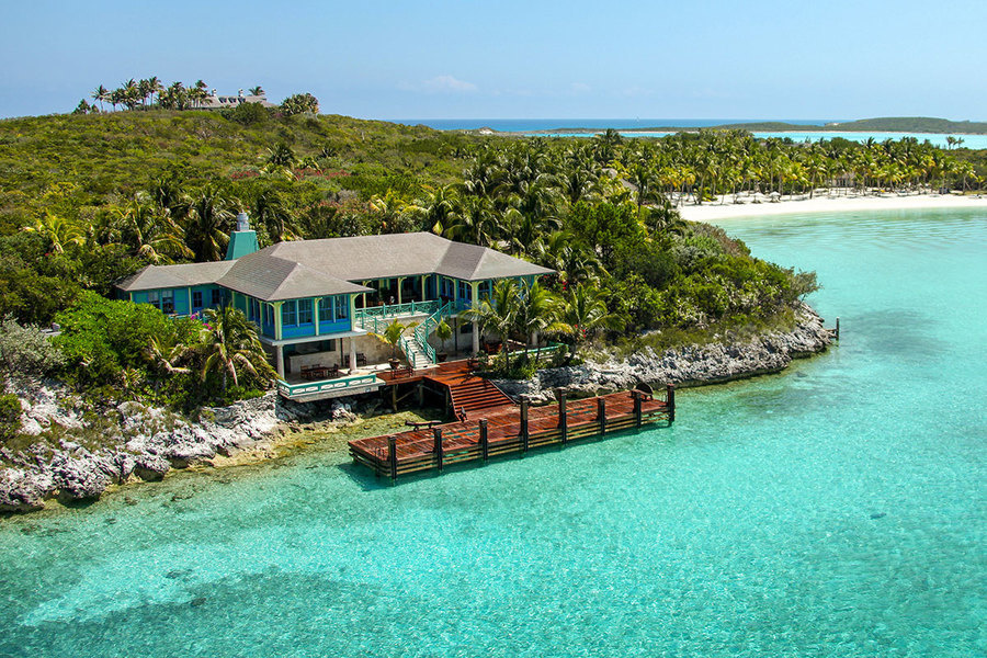 A boat landing and villa of Musha Cay