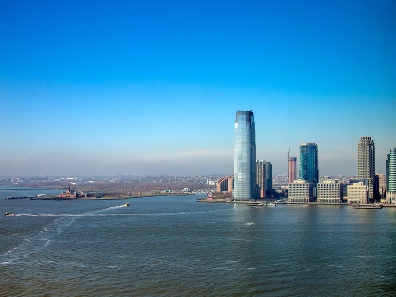 The condonium is next to Rockefeller Park and the Hudson River.
