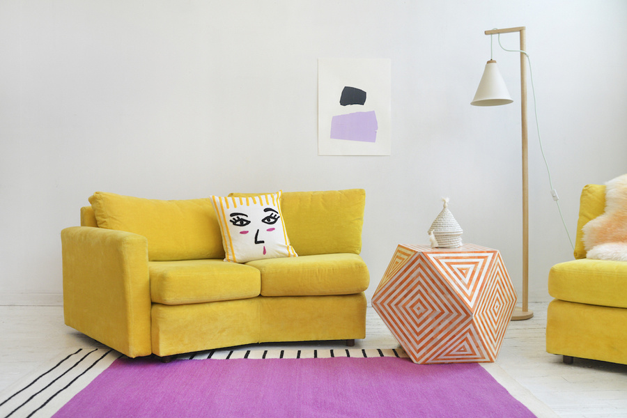 A bold mix of color and pattern underfoot designed by Aelfie Oudghiri enhances this room’s eclectic f