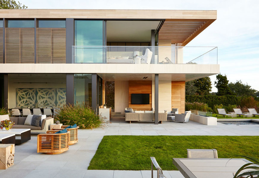 This outdoor kitchen designed by Blaze Makoid of Blaze Makoid Architecture in Sagaponack integrates m