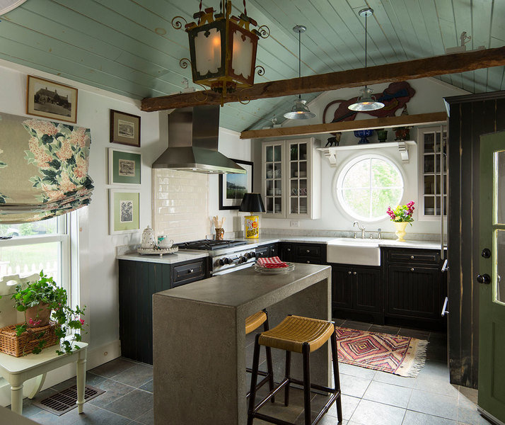 The bones of a home designed by Madcap Cottage, including its vaulted ceilings and exposed beams, hel